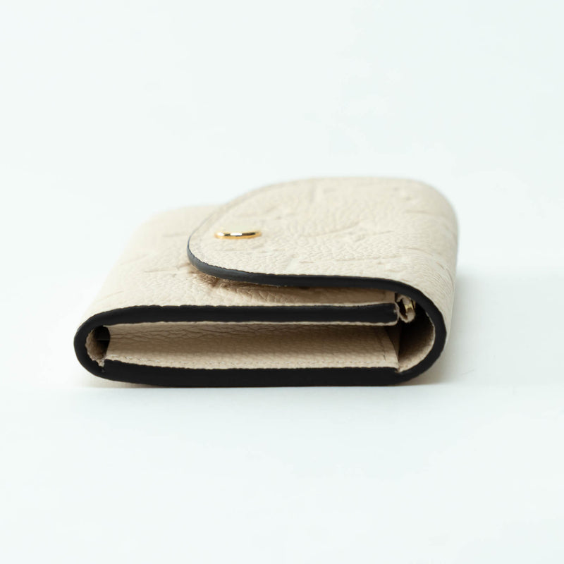 Louis Vuitton Ivory Embossed Monogram Leather Wallet