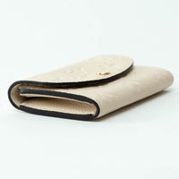 Louis Vuitton Ivory Embossed Monogram Leather Wallet