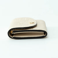 Louis Vuitton Ivory Embossed Monogram Leather Wallet