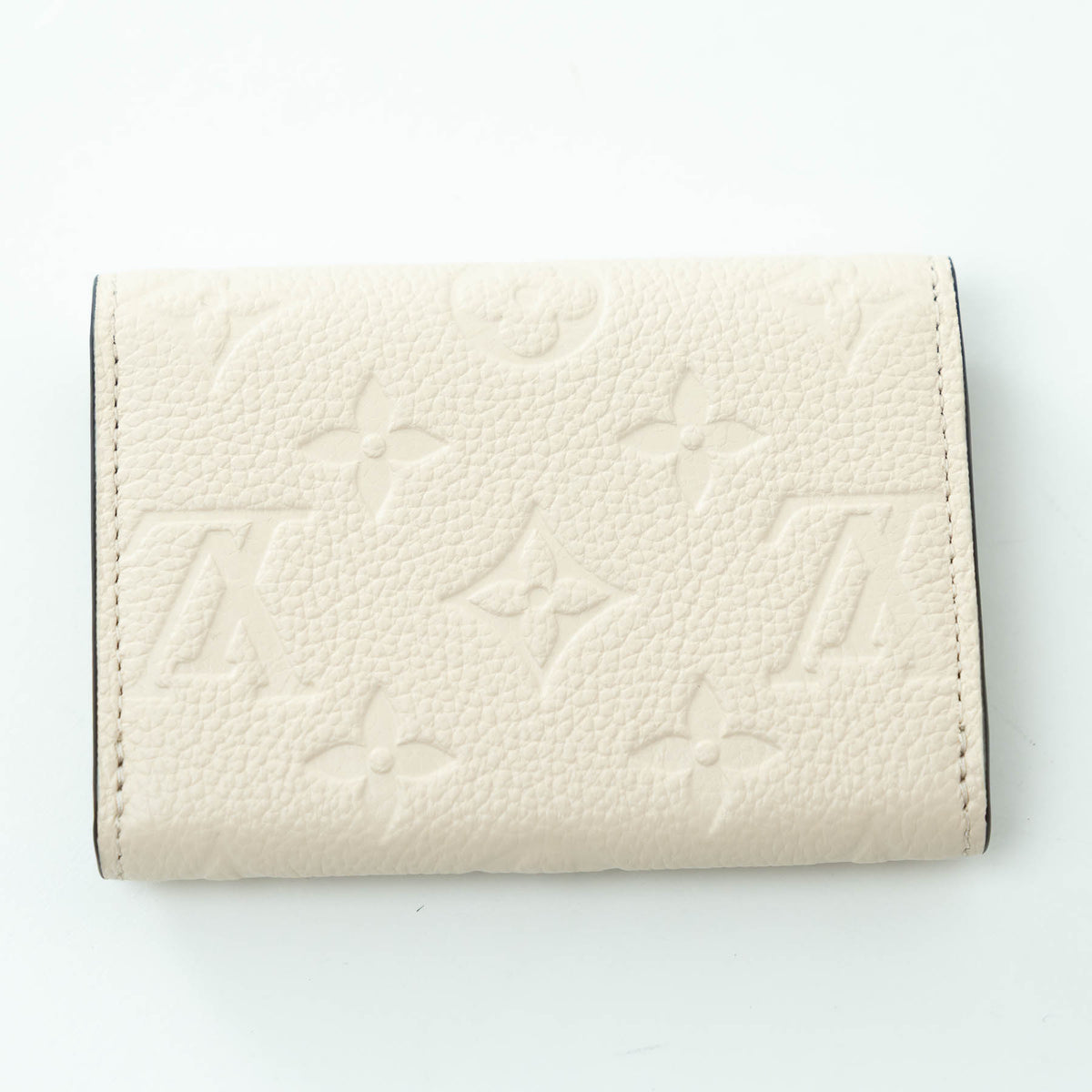 Louis Vuitton Ivory Embossed Monogram Leather Wallet