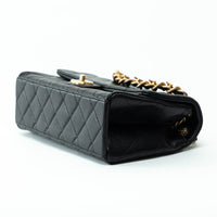 Pre-Loved Chanel™ Black Grained Leather Medium Flap Bag with Logo Chain