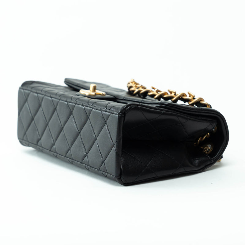 Pre-Loved Chanel™ Black Grained Leather Medium Flap Bag with Logo Chain