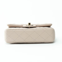 Pre-Loved Chanel™ nude Grained Leather Mini Flap Bag