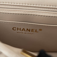 Pre-Loved Chanel™ nude Grained Leather Mini Flap Bag