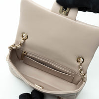 Pre-Loved Chanel™ nude Grained Leather Mini Flap Bag