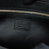 Gucci Black Grained Leather Flap Bag with Shearling Trim