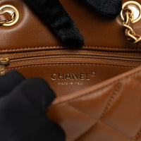 Pre-Loved Chanel™ Brown Lambskin Leather and Shearling Crossbody Bag