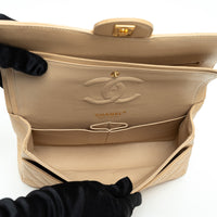 Pre-Loved Chanel ™ Tan Grained Leather Medium Classic Double Flap Bag