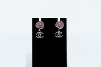pink enamel camellia earrings with logo drop (front)