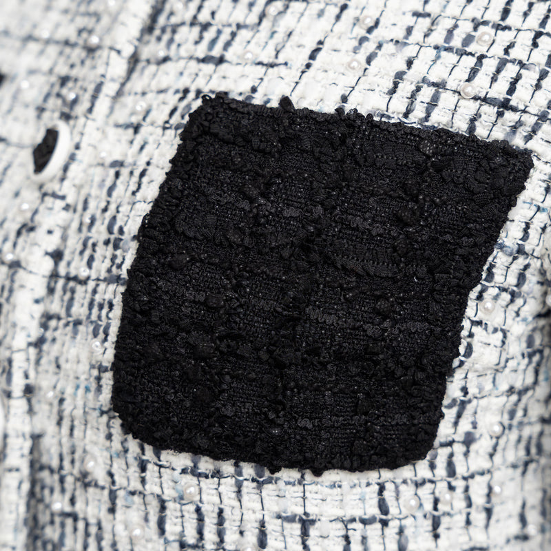 Pre-Loved Chanel™ White and Black Tweed Jacket Embellished with Faux Pearls Size 36