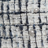 Pre-Loved Chanel™ White and Black Tweed Jacket Embellished with Faux Pearls Size 36