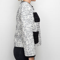 Pre-Loved Chanel™ White and Black Tweed Jacket Embellished with Faux Pearls Size 36