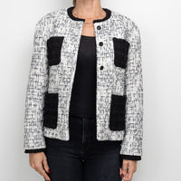 Pre-Loved Chanel™ White and Black Tweed Jacket Embellished with Faux Pearls Size 36