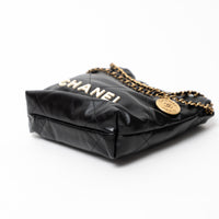 Pre-Loved Chanel™ Black Lambskin Leather Mini 22 Crossbody Bag with White Resin Logo