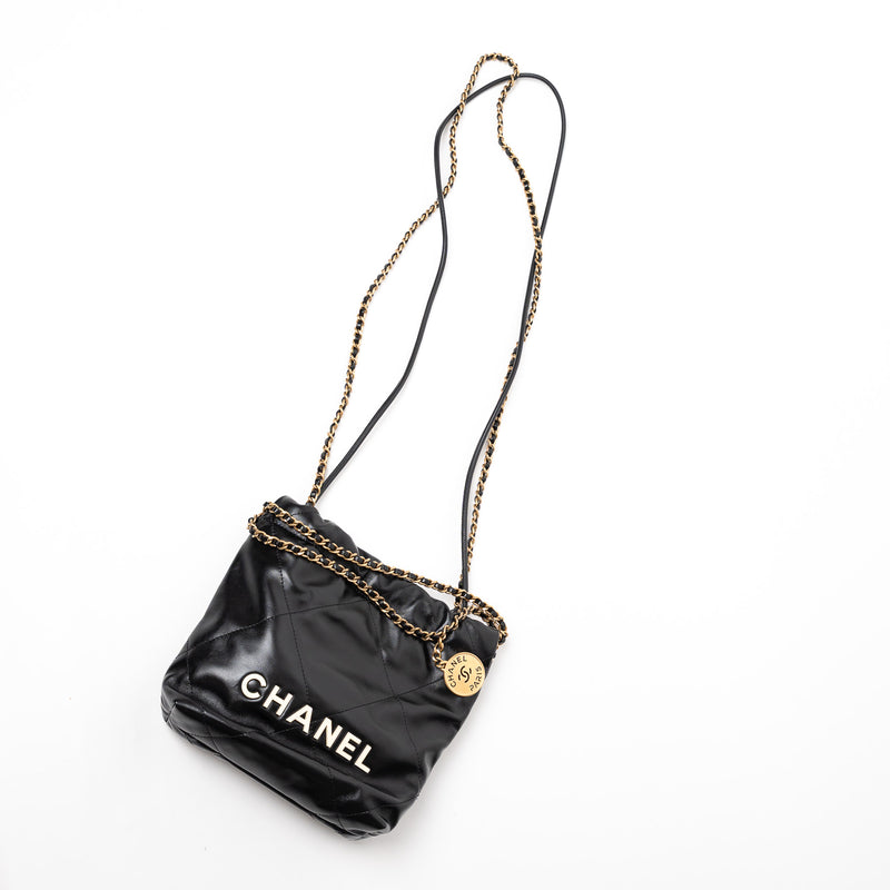 Pre-Loved Chanel™ Black Lambskin Leather Mini 22 Crossbody Bag with White Resin Logo