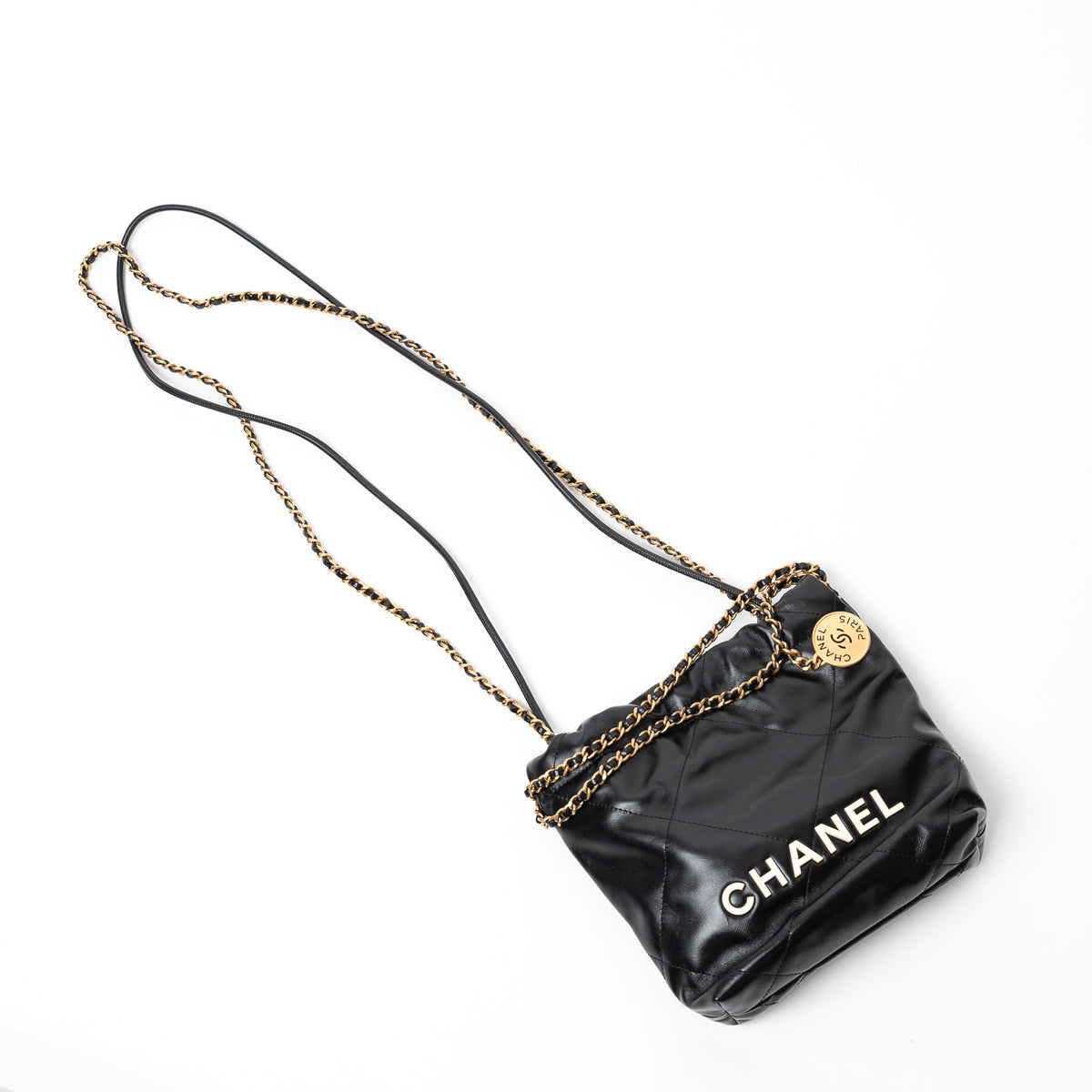 Pre-Loved Chanel™ Black Lambskin Leather Mini 22 Crossbody Bag with White Resin Logo