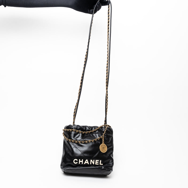 Pre-Loved Chanel™ Black Lambskin Leather Mini 22 Crossbody Bag with White Resin Logo