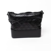 Pre-Loved Chanel™ Black Aged Calfskin Leather Medium Gabrielle Shoulder Bag with Black Hardware
