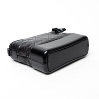 Pre-Loved Chanel™ Black Aged Calfskin Leather Medium Gabrielle Shoulder Bag with Black Hardware