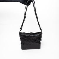 Pre-Loved Chanel™ Black Aged Calfskin Leather Medium Gabrielle Shoulder Bag with Black Hardware
