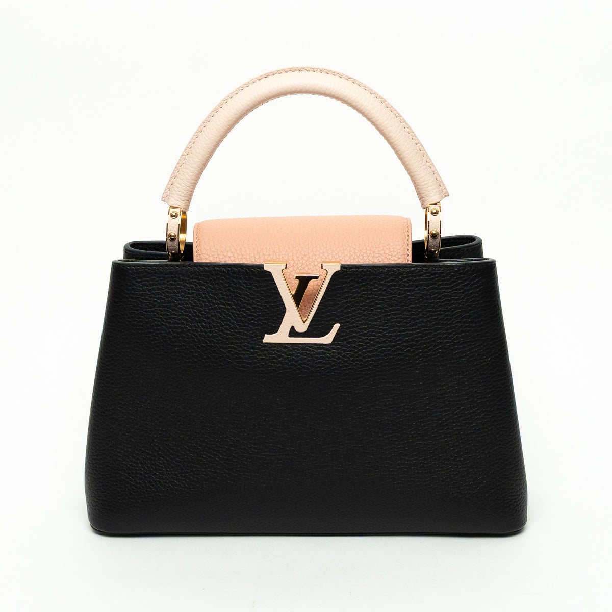 Black handbag with pink handle and logo on a white background