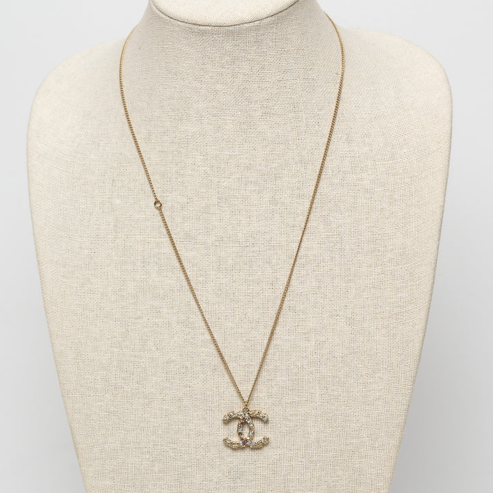 Pre-Loved Chanel™ Gold Tone Interlocking Logo Pendant Inset with Multicolor Crystals