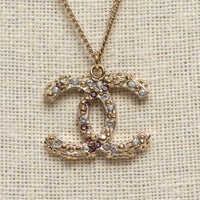Pre-Loved Chanel™ Gold Tone Interlocking Logo Pendant Inset with Multicolor Crystals