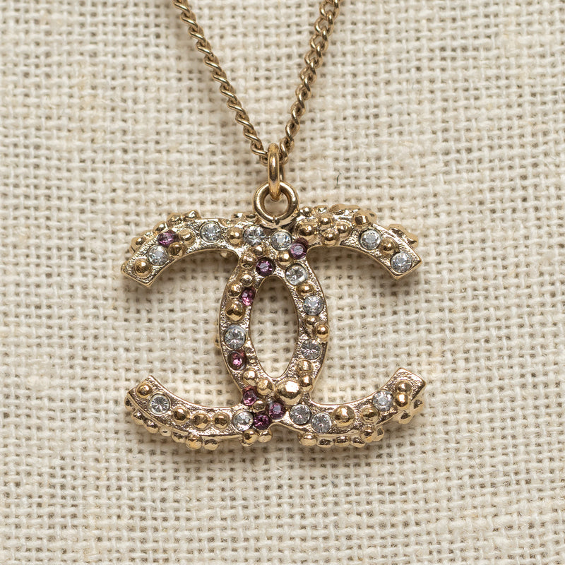 Pre-Loved Chanel™ Gold Tone Interlocking Logo Pendant Inset with Multicolor Crystals