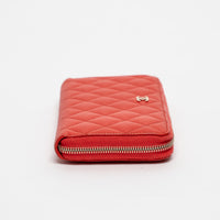 Pre-Loved Chanel™ Coral Pebbled Leather Zip Around Continental Wallet
