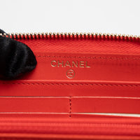 Pre-Loved Chanel™ Coral Pebbled Leather Zip Around Continental Wallet