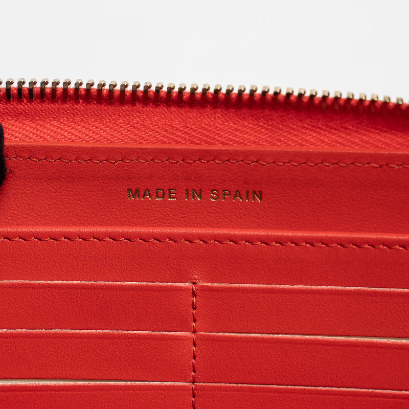 Pre-Loved Chanel™ Coral Pebbled Leather Zip Around Continental Wallet
