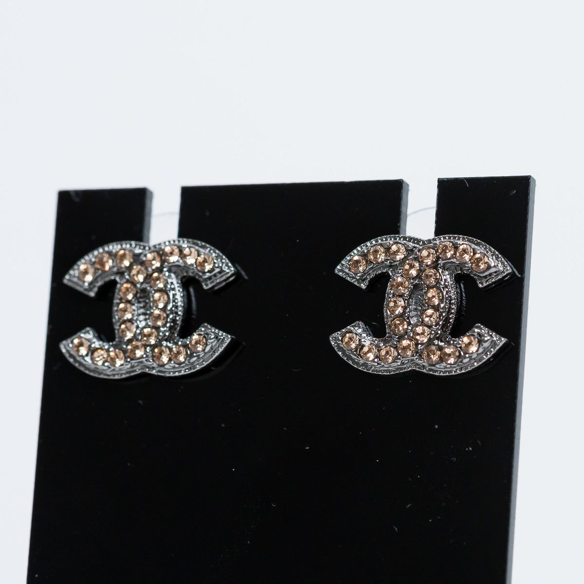 Pre-Loved Chanel™ Gunmetal Amber Crystal Logo Stud Earrings
