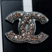 Pre-Loved Chanel™ Gunmetal Amber Crystal Logo Stud Earrings