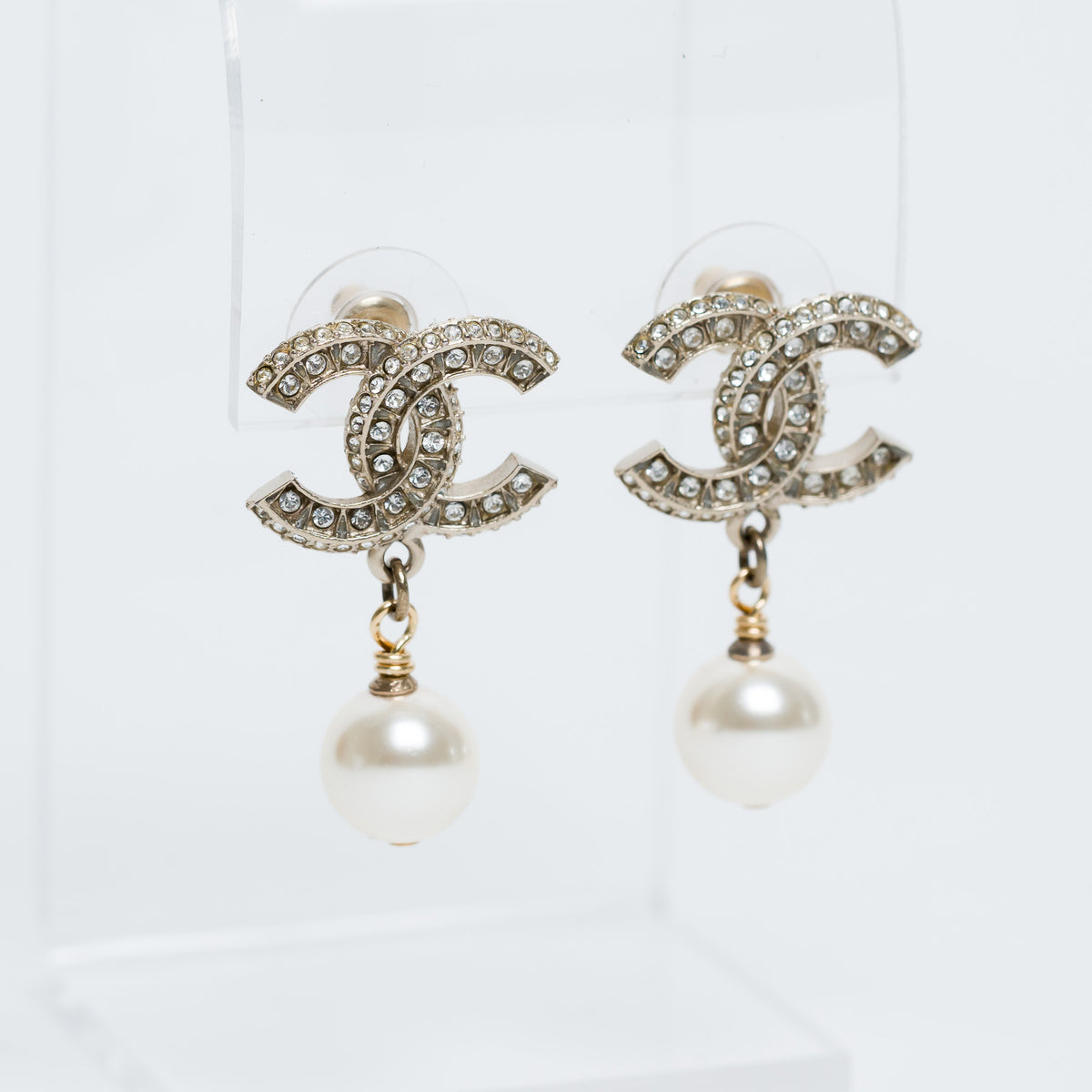 Pre-Loved Chanel™ Gold Tone Inset Crystal Logo with Faux Pearl Drop Earrings