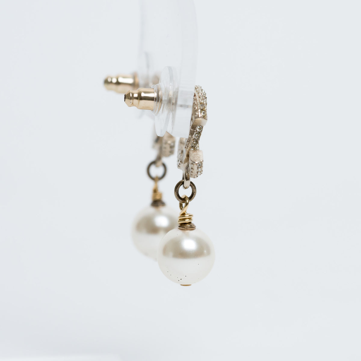 Pre-Loved Chanel™ Gold Tone Inset Crystal Logo with Faux Pearl Drop Earrings
