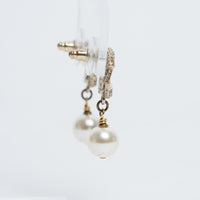 Pre-Loved Chanel™ Gold Tone Inset Crystal Logo with Faux Pearl Drop Earrings