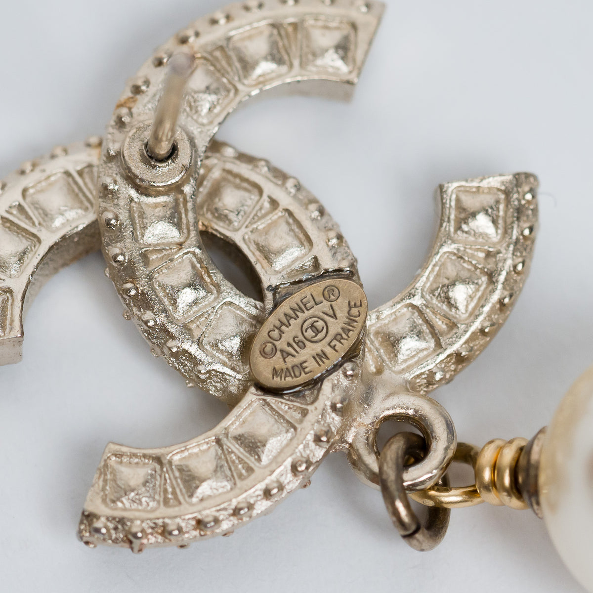 Pre-Loved Chanel™ Gold Tone Inset Crystal Logo with Faux Pearl Drop Earrings