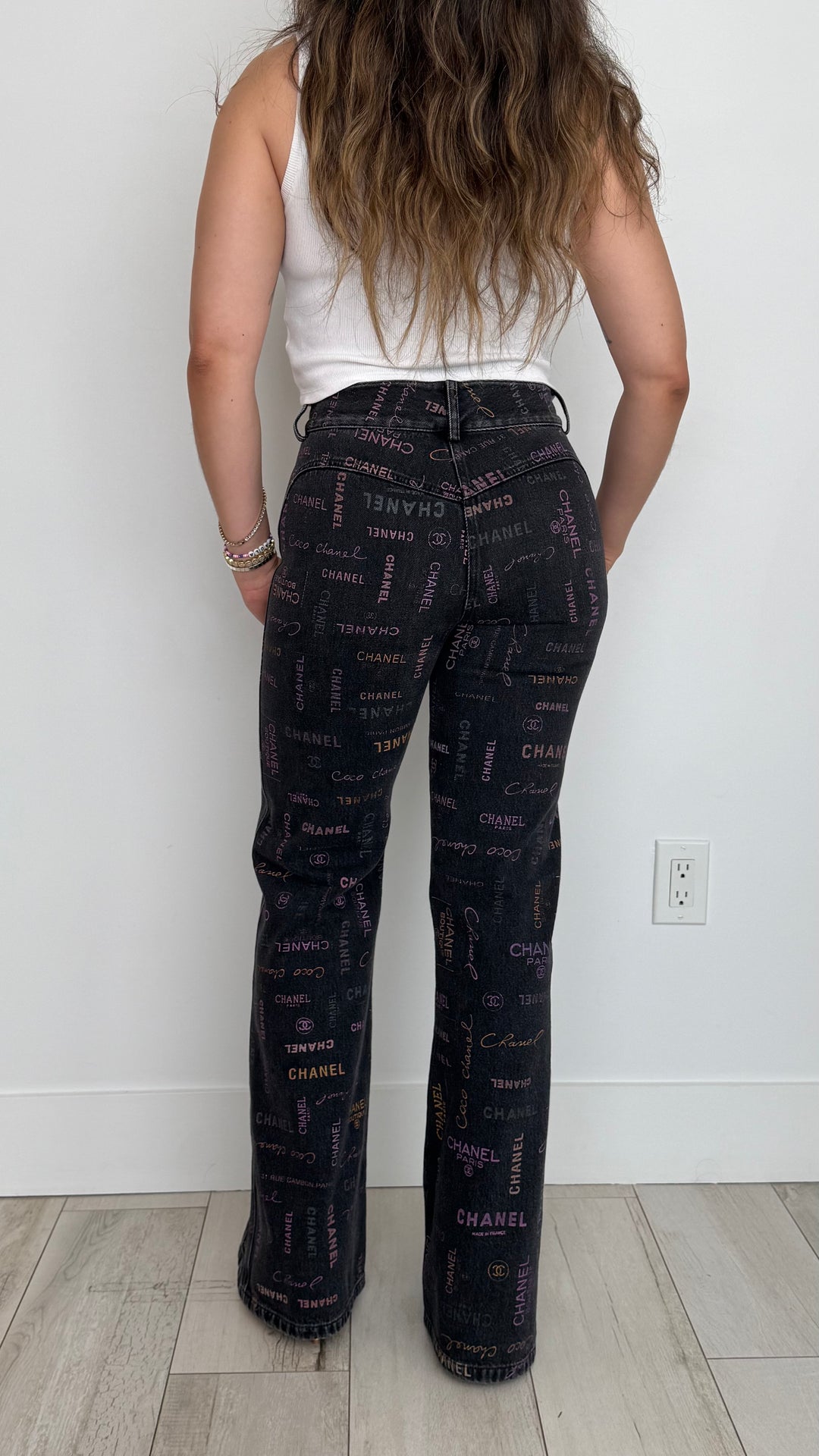 Pre-Loved Chanel™ Black Jeans with Multicolour Pink Logo Print Size 34