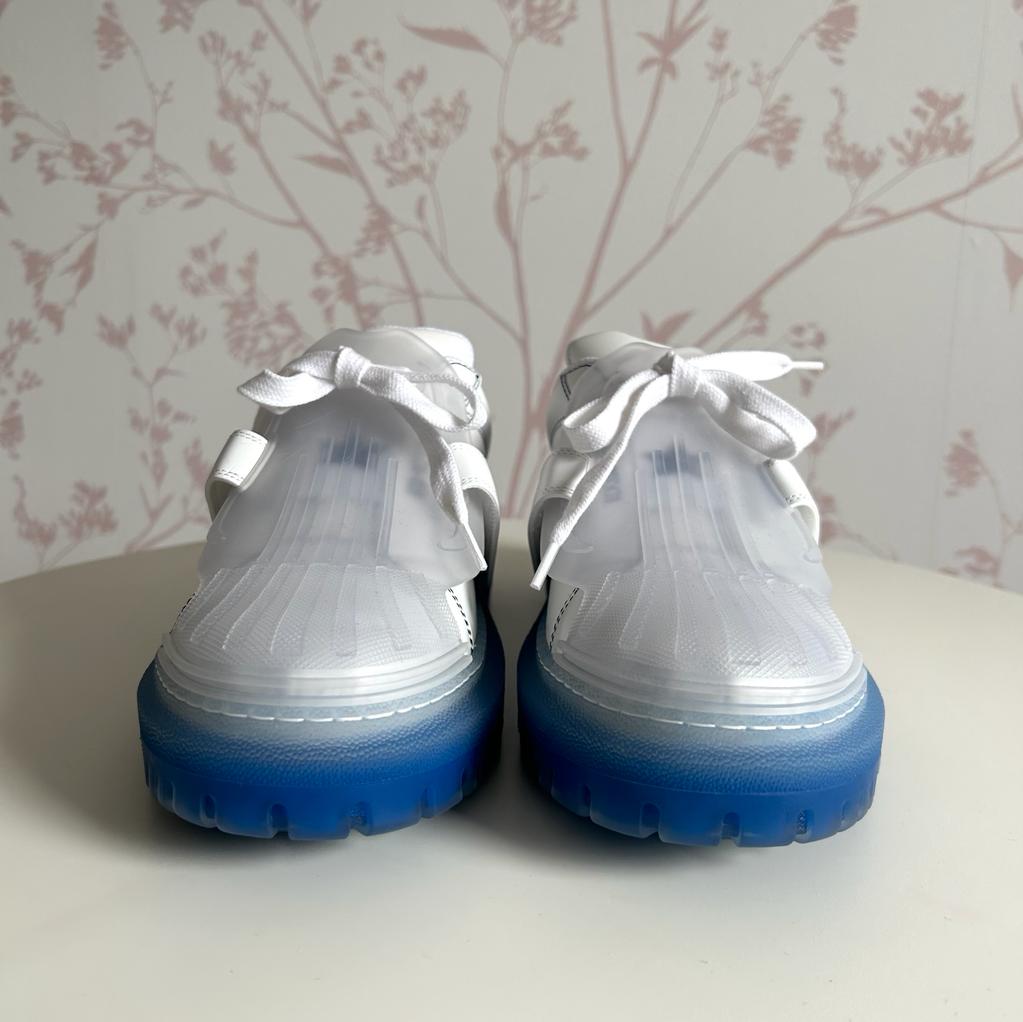 White and Blue Sneakers with Velcro Strap.  (front)