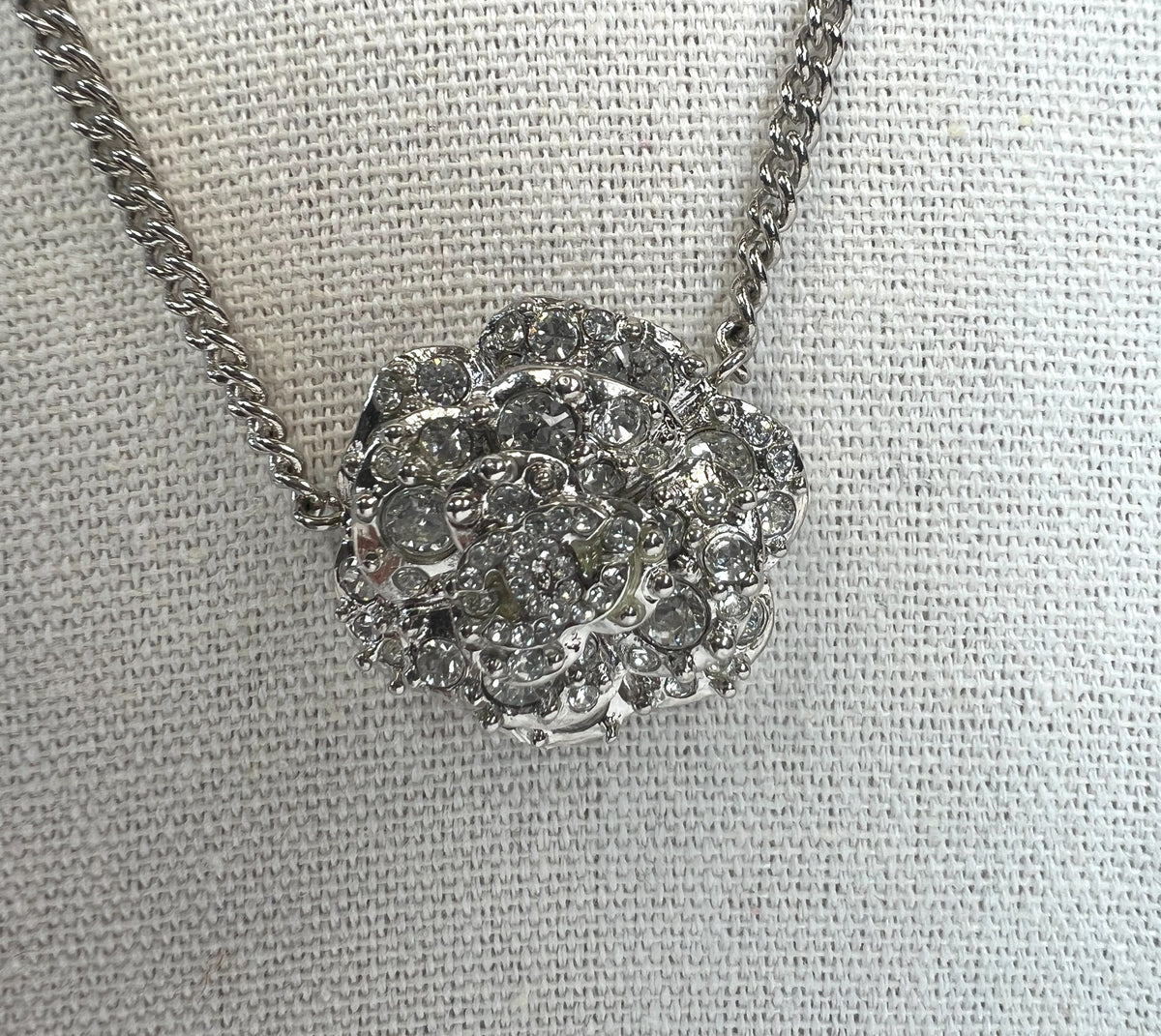 Excellent Pre-Loved Silver Tone Crystal Embellished 3-Tier Camellia Pendant Necklace. (close up)