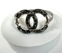 Excellent Pre-Loved Dark Silver Tone Bracelet with Crystal Embellished Logo Clasp (front)