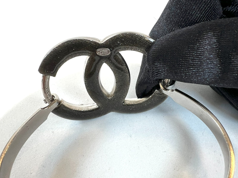 Excellent Pre-Loved Dark Silver Tone Bracelet with Crystal Embellished Logo Clasp (stamp)