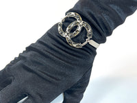 Excellent Pre-Loved Dark Silver Tone Bracelet with Crystal Embellished Logo Clasp(close up)