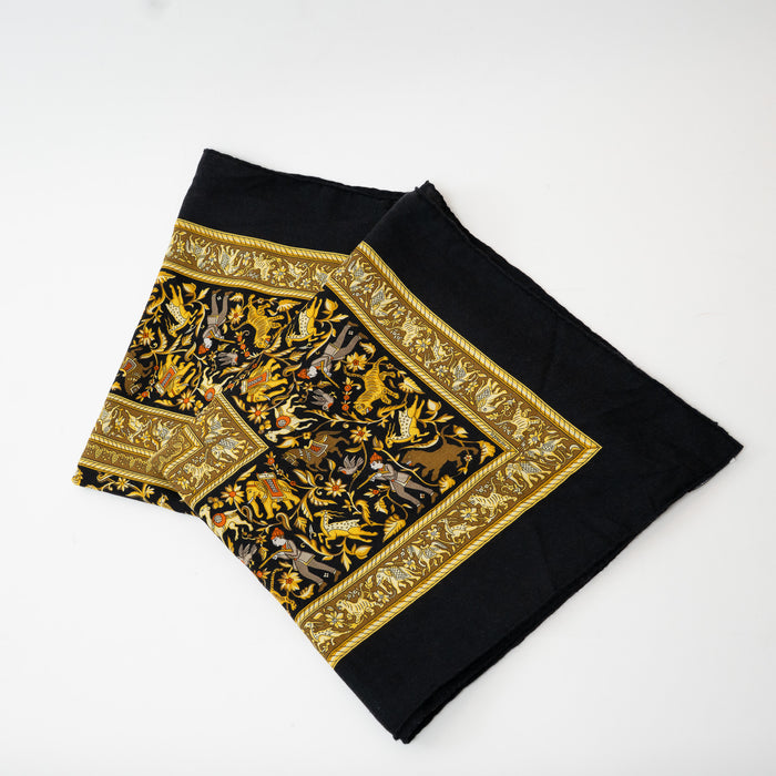 Hermes Black and Gold Silk Chasse En Inde Scarf with motifs of Hunters, Birds, Lions, Tigers, Elephants, Gazelles, Horses, and Flowers 