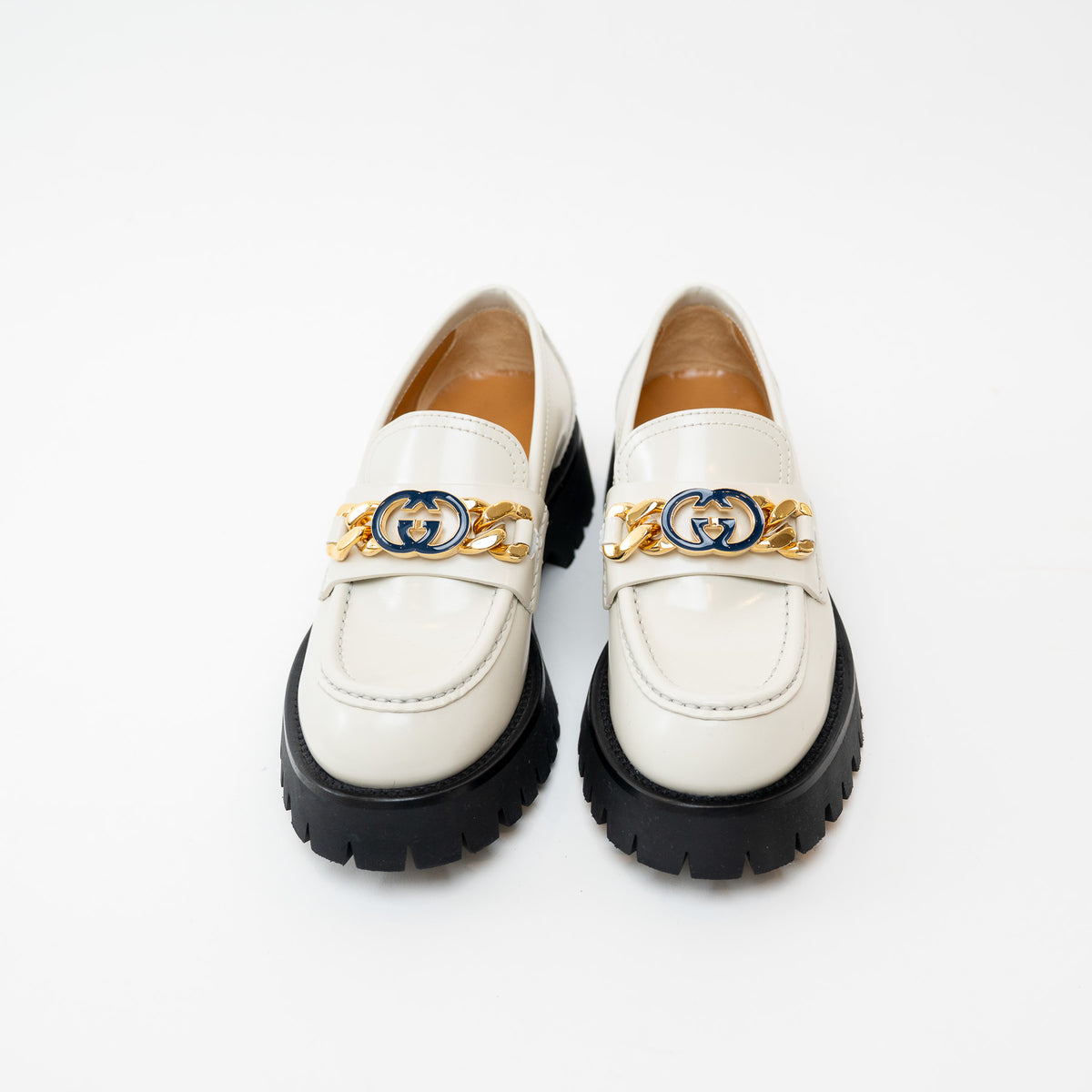 Front View of Gucci Gold Interlocking GG Chain White Leather Platform Loafers 