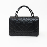 Pre-Loved Chanel™ Black Grained Quilted Leather Large Trendy Bag