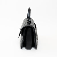 Pre-Loved Chanel™ Black Grained Quilted Leather Large Trendy Bag