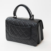 Pre-Loved Chanel™ Black Grained Quilted Leather Large Trendy Bag