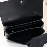 Pre-Loved Chanel™ Black Grained Quilted Leather Large Trendy Bag