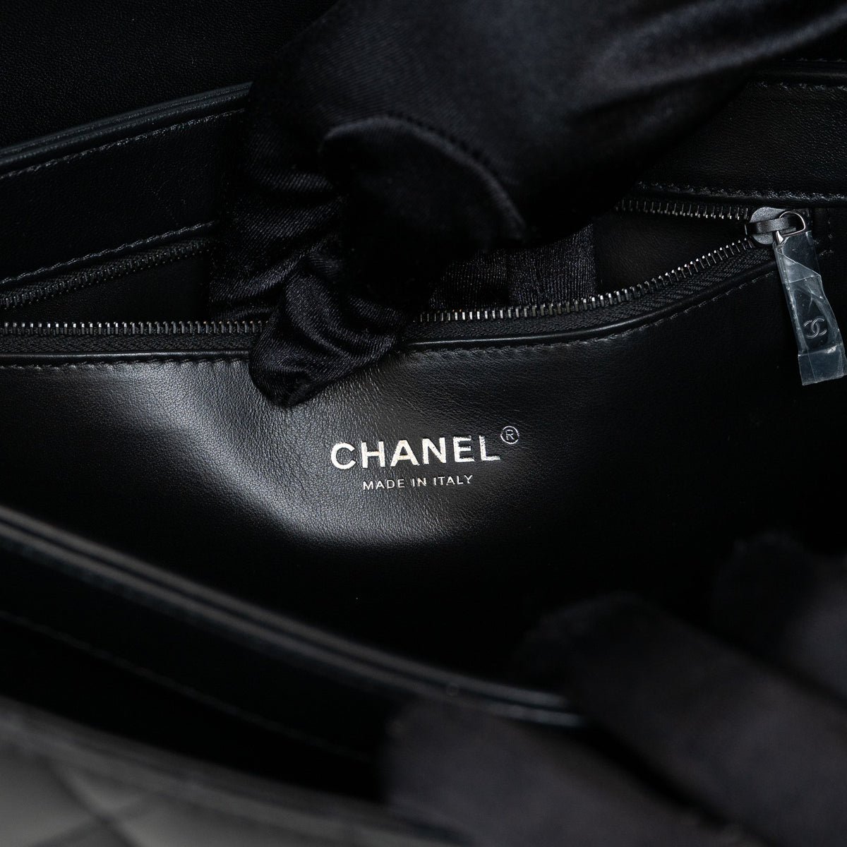 Pre-Loved Chanel™ Black Grained Quilted Leather Large Trendy Bag